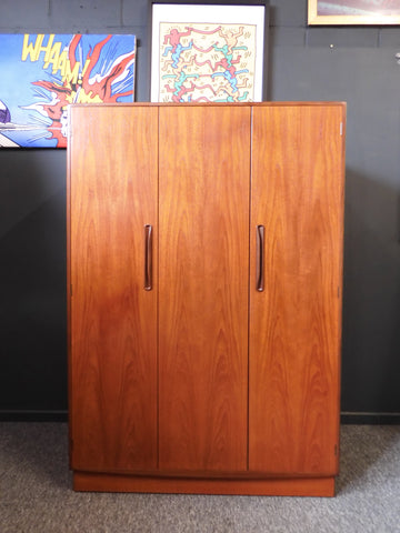 G-Plan Fresco triple wardrobe in golden teak wood with sculpted handles, British Mid-Century Modern furniture