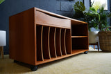 Vintage Danish Mid Century Teak Media Unit with sculpted drawer pull and record storage on casters