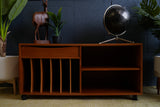 Vintage Danish Mid Century Teak Media Unit with sculpted drawer pull and record storage on casters