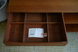 Vintage Danish Mid Century Teak Media Unit with sculpted drawer pull and record storage on casters