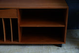 Vintage Danish Mid Century Teak Media Unit with sculpted drawer pull and record storage on casters
