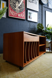Vintage Danish Mid Century Teak Media Unit with sculpted drawer pull and record storage on casters