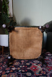 Vintage Chesterfield deep buttoned footstool in antiqued olive green leather with hardwood legs