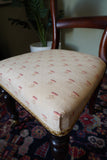 Victorian mahogany balloon back chair with brass castors and newly reupholstered patterned seat