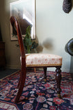 Victorian mahogany balloon back chair with brass castors and newly reupholstered patterned seat