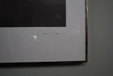 Pair of large framed architectural prints by Richard Davies depicting the Chrysler Building and Empire State Building mounted on wall