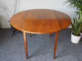 Mid Century Round Teak Drop-Leaf Table with Afromosia Wood Legs - erfmann-vintage