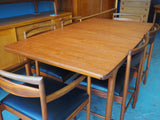 Mid Century McIntosh Dining Table & 6 Chairs Black Vinyl - erfmann-vintage