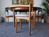 Mid Century Teak Circular Extending Dining Table & 4 Reupholstered Chairs in Grey - erfmann-vintage